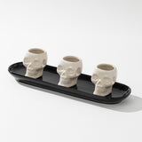 Black Dish w/ Skeleton Bowls