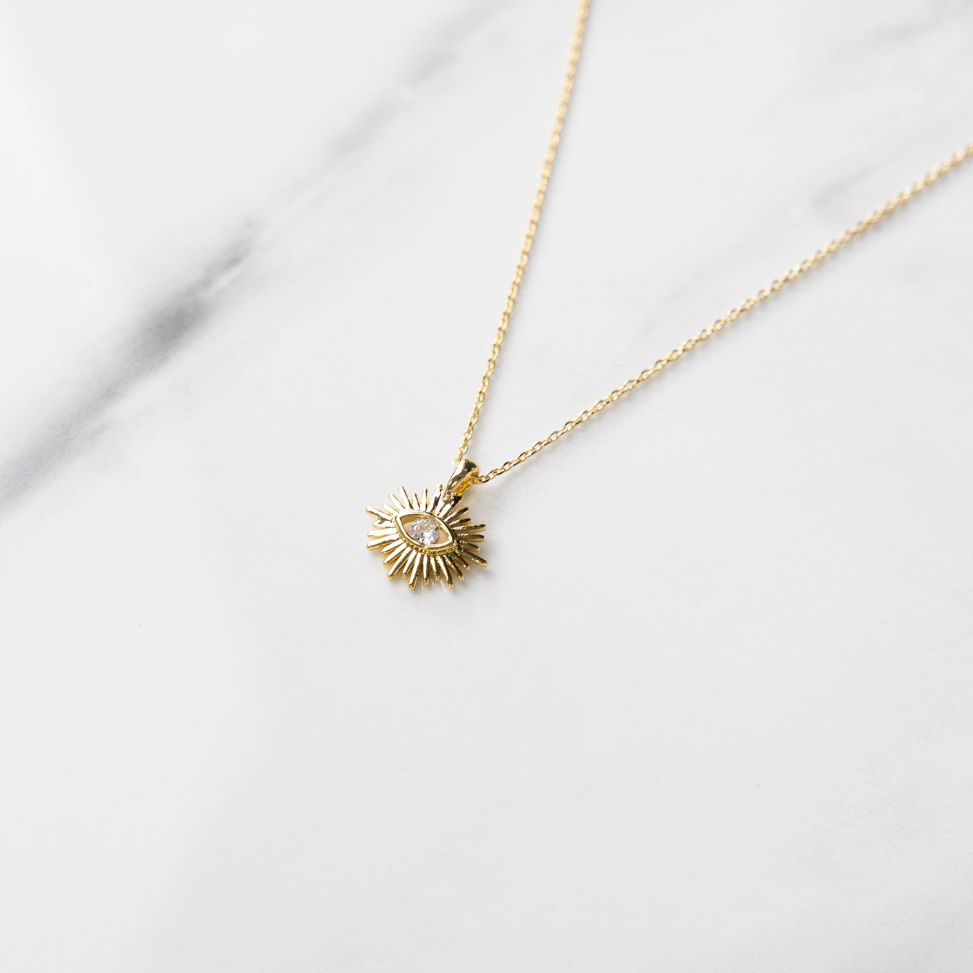 Ellie Sunburst Eye Necklace