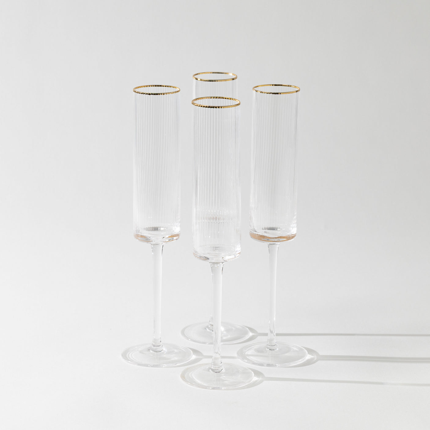 Optic Champagne Glass Set w/ Gold Rim